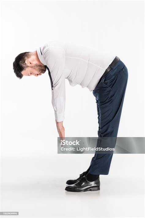 Overweight man bending over Stock Photos and Images